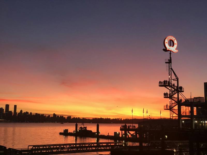 Lonsdale Quay at sunset with Vancouver skyline across Burrard Inlet