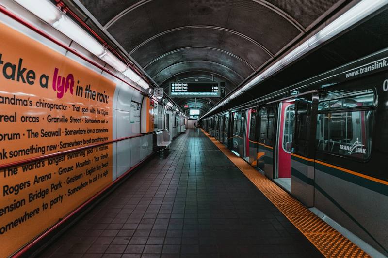Vancouver SkyTrain station platform with TransLink train