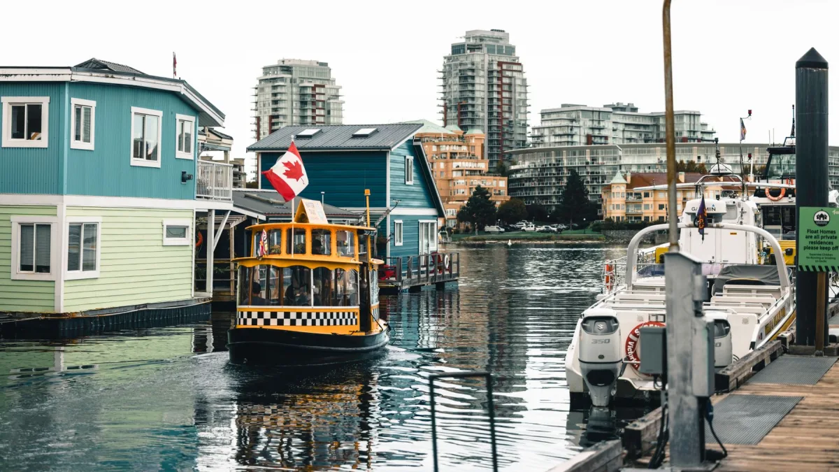 Water taxi and floating homes in Victoria Inner Harbour