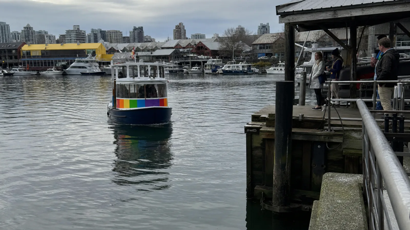 Small passenger ferry approaching Granville Island